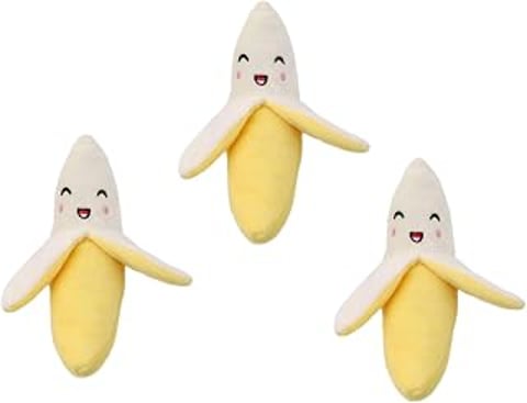 Three yellow banana plush toys.