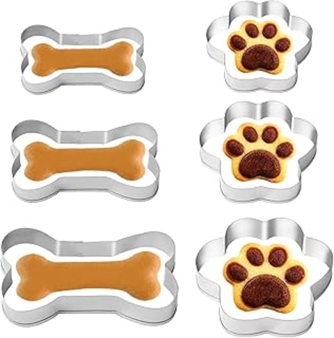 A set of six bone and dog footprint molds.