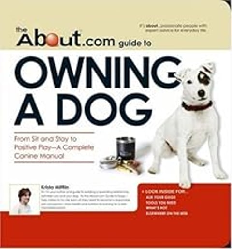 A dog is on the cover of the About.com Guide to Owning a Dog.