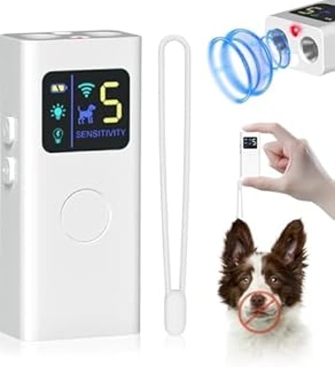 A white device that is used to stop dogs from barking.