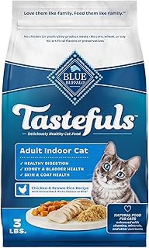A cat with blue eyes and a brown and white coat is on the label of a bag of Tastefuls Adult Indoor Cat food.