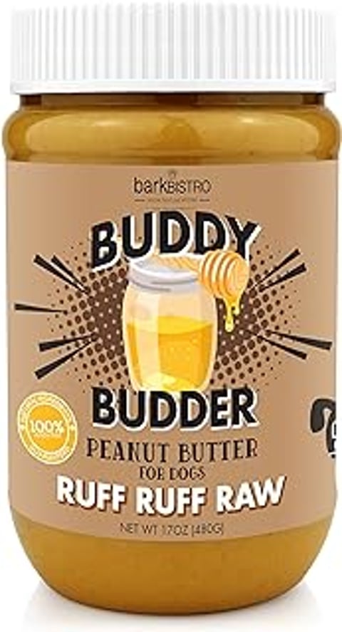 A jar of Buddy Budder peanut butter for dogs.