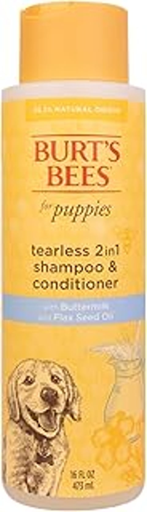 A yellow bottle of Burt's Bees for Pets Tear Free Shampoo & Conditioner.