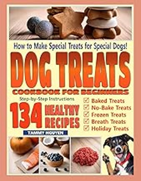 A cookbook for dog treats is displayed with a dog on the cover.