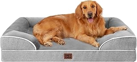 A dog is laying on a dog bed.