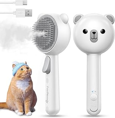 A cat is sitting next to a white hair dryer.