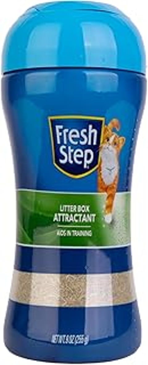A blue and green Fresh Step litter box attractant.