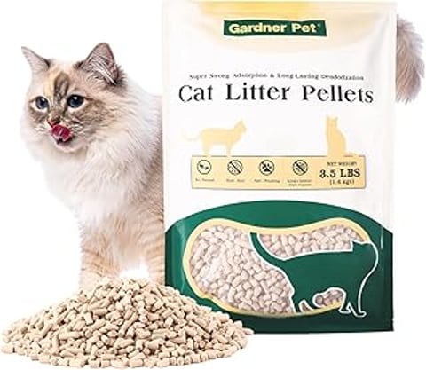 A cat litter box with a bag of cat litter pellets.