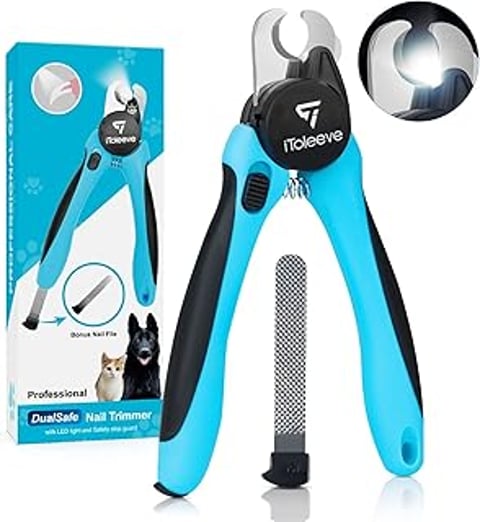 A blue nail clipper with a light on it.