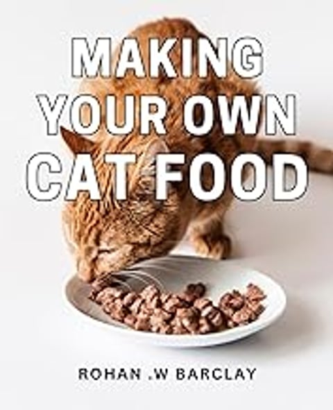 A cat eating food from a bowl.