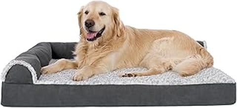 A large dog is laying on a dog bed.