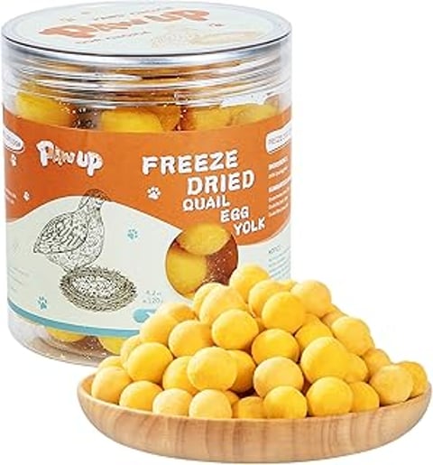 A container of freeze dried quail egg yolk.