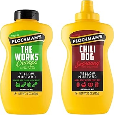 Two bottles of mustard and chili sauce.