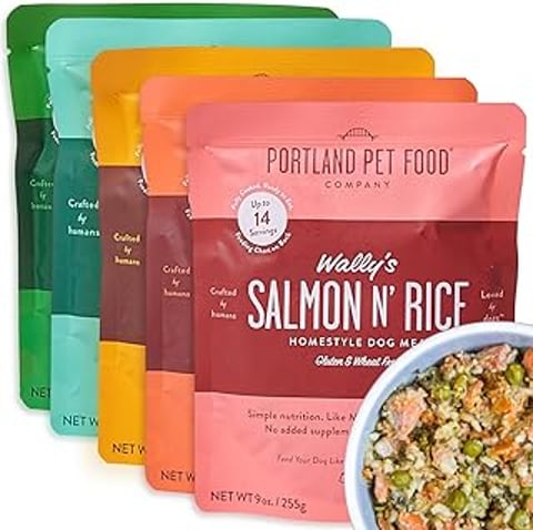 A bowl of food with the words Walley's Salmon & Rice on it.