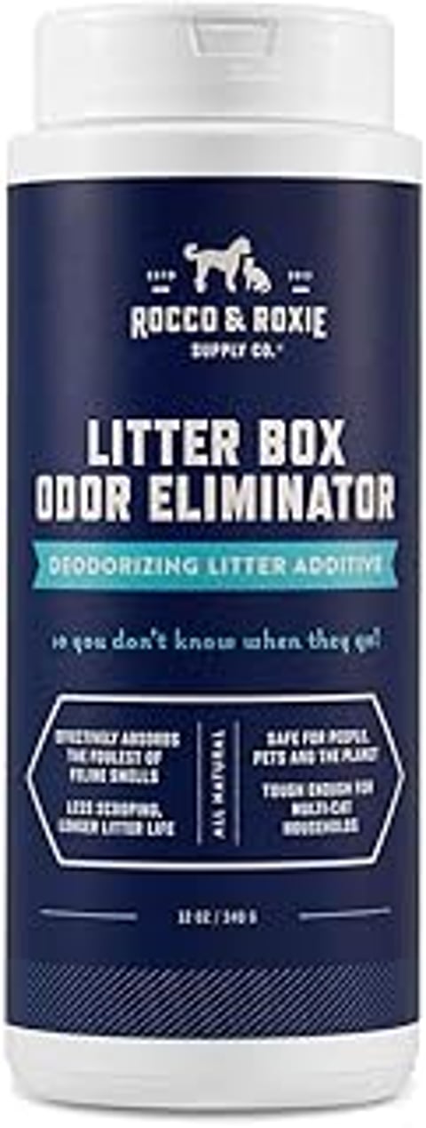 A bottle of Rocco & Roxie Litter Box Odor Eliminator.