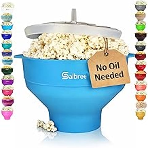A blue microwave popcorn popper with a sign that says "no oil needed".