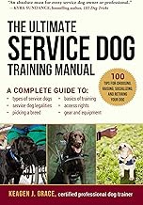 A book titled The Ultimate Service Dog Training Manual.