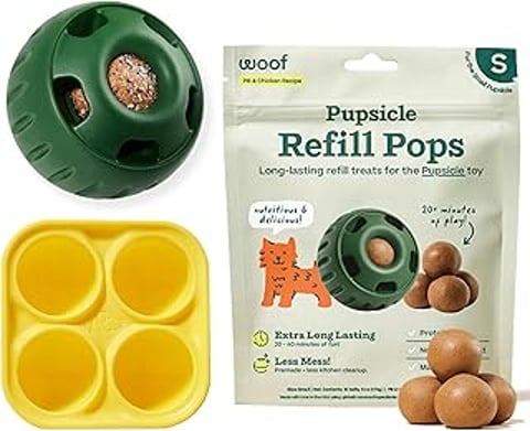 A green dog toy with a chicken flavored treat inside.