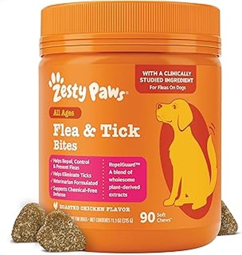 A jar of Zesty Paws Flea and Tick Prevention Bites.